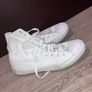 white monochrome converse high top sneakers